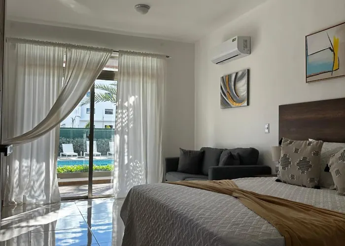 Palms B104 - 2-Br App Mit Pool-Blick & Shuttle