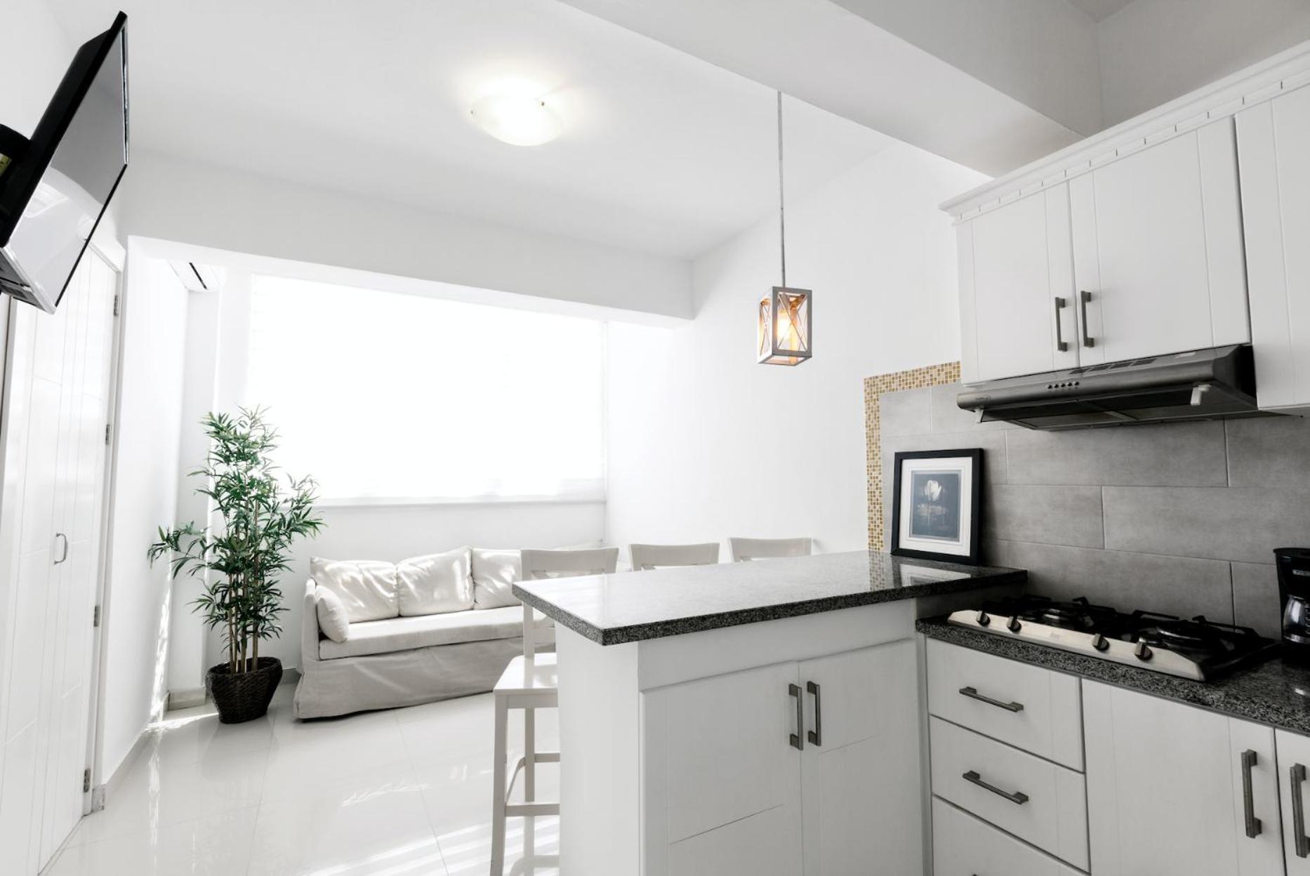 Caribbean Dеluxe With Rоoftop Pool And Access Apartamento Punta Cana