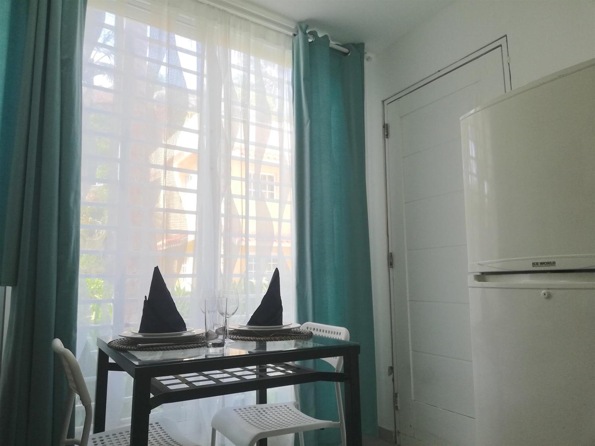 Apartahotel With Garden View